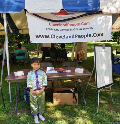 The youngest volunteer at the ClevelandPeople.com booth